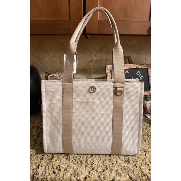 lululemon athletica Handbags - Lululemon Two-Tone Canvas Tote 10L Mohave Tan/Light Ivory NWT Large Tote
